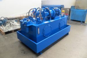 Hydraulic system for the transportation of tambours